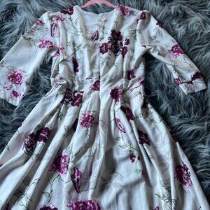 Floral dress brand new with tags XL zip back super polyester wears like a large